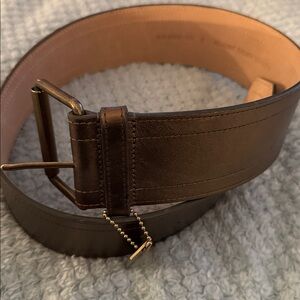 Metallic bronze leather belt from the vintage Nicole Miller Collection.